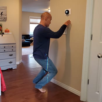 calf raises against wall
