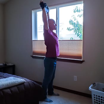 stretching while getting dressed