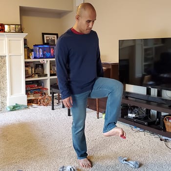 picking toy up with toes
